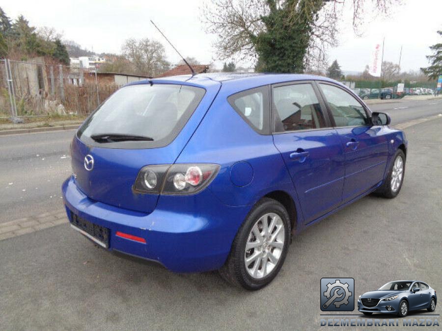 Amortizor capota mazda 3 2010